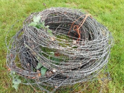 USED ROLL OF BARBED WIRE