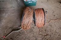 2 LARGE REELS OF USED ELEC FENCING WIRE