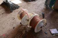 2 REELS OF USED ELECTRIC FENCING WIRE - 2