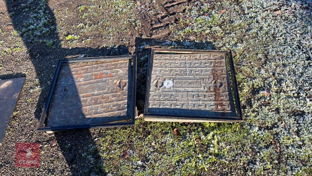 2 MANHOLE COVERS