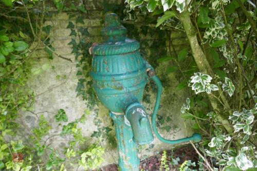 D. CHRISTIE ORNATE TEAPOT WELL PUMP