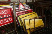 LRG QTY OF ROAD SIGNS & HOLDERS - 4