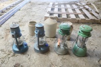 4 TILLY LAMPS & 3 STONE JARS - 4