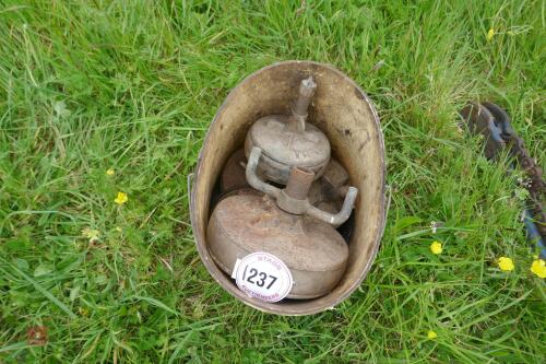 BUCKET OF PARAFFIN HEATER BASES