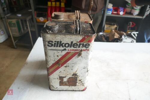 2 CANS OF SICKOLENE CHAIN OIL