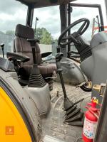 NEW HOLLAND LB110B TURBO WHEEL DIGGER - 23