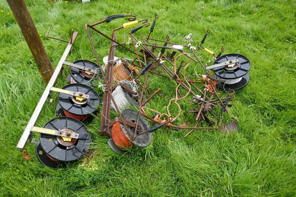 2 ELECTRIC FENCE REEL TREE POSTS