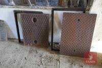 2 IRON MANHOLE COVERS & FRAMES