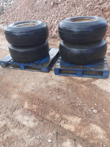 4 FORMER AEROPLANE TYRES AND RIMS