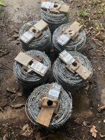 UNUSED BARBED WIRE ROLLS