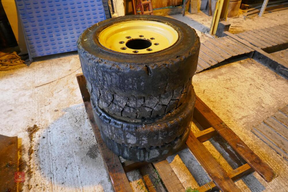 4 USED SKID STEER WHEELS & TYRES