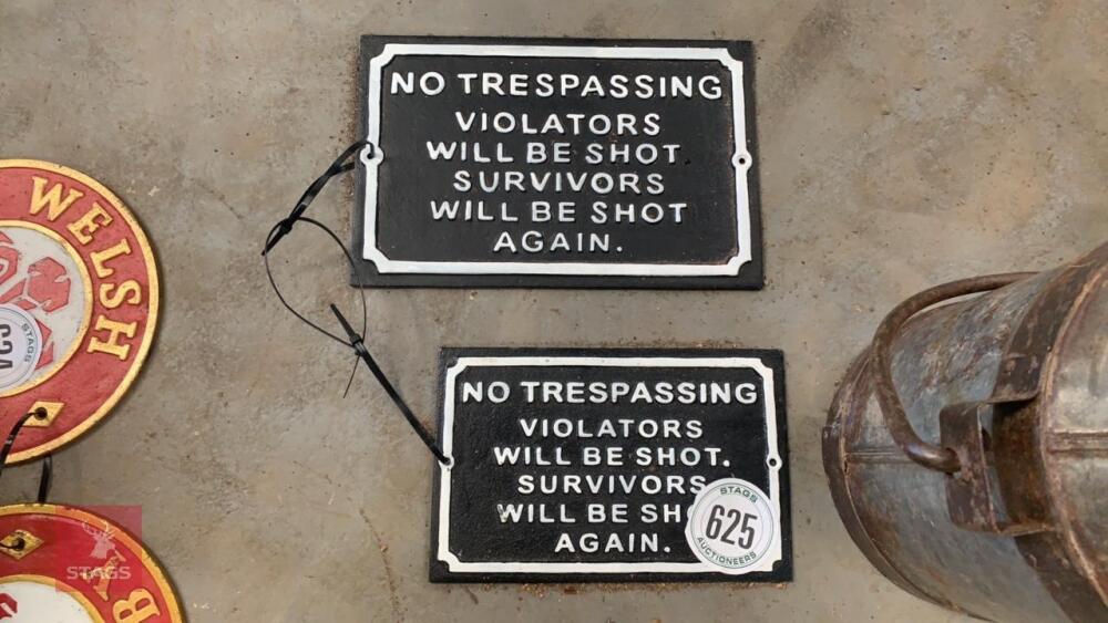 2 NO TRESPASSING SIGNS